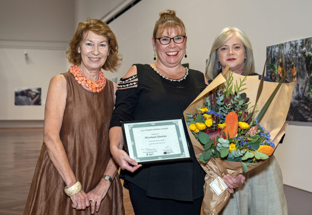 Maxine McKew and Sarah Slade pictured presenting Award to Narelle Stute