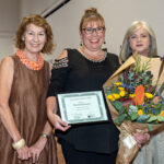 Maxine McKew and Sarah Slade pictured presenting Award to Narelle Stute