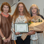 Photograph of Maxine McKew and Sarah Slade presenting the Barrett Reid Scholarship to Nerida Dye