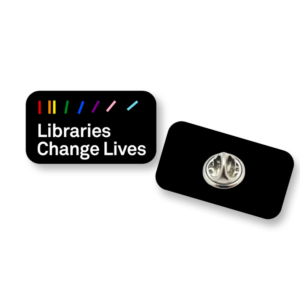The front and back of the 'Libraries Changes Lives' lapel pins. They feature a black background with rainbow lines above the text 'Libraries Change Lives'